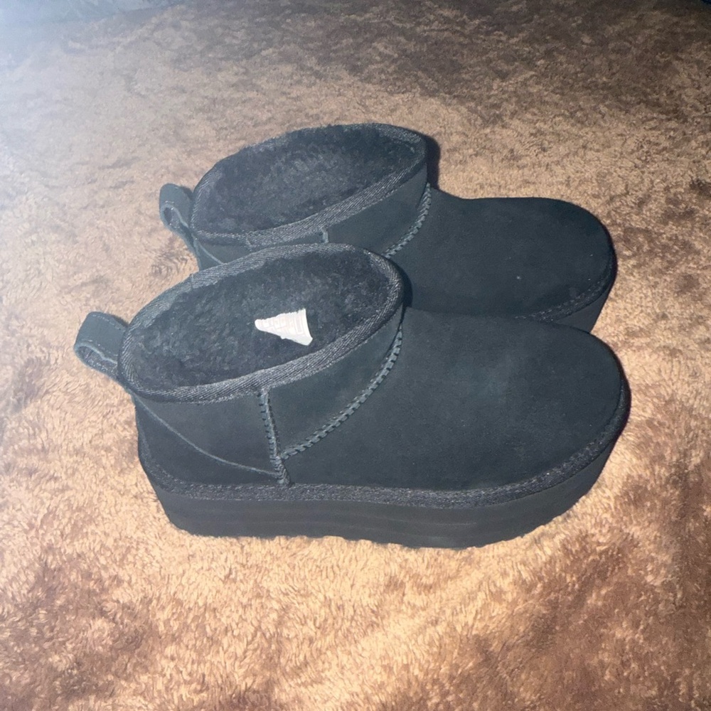 Ugg classic ultra mini booties .